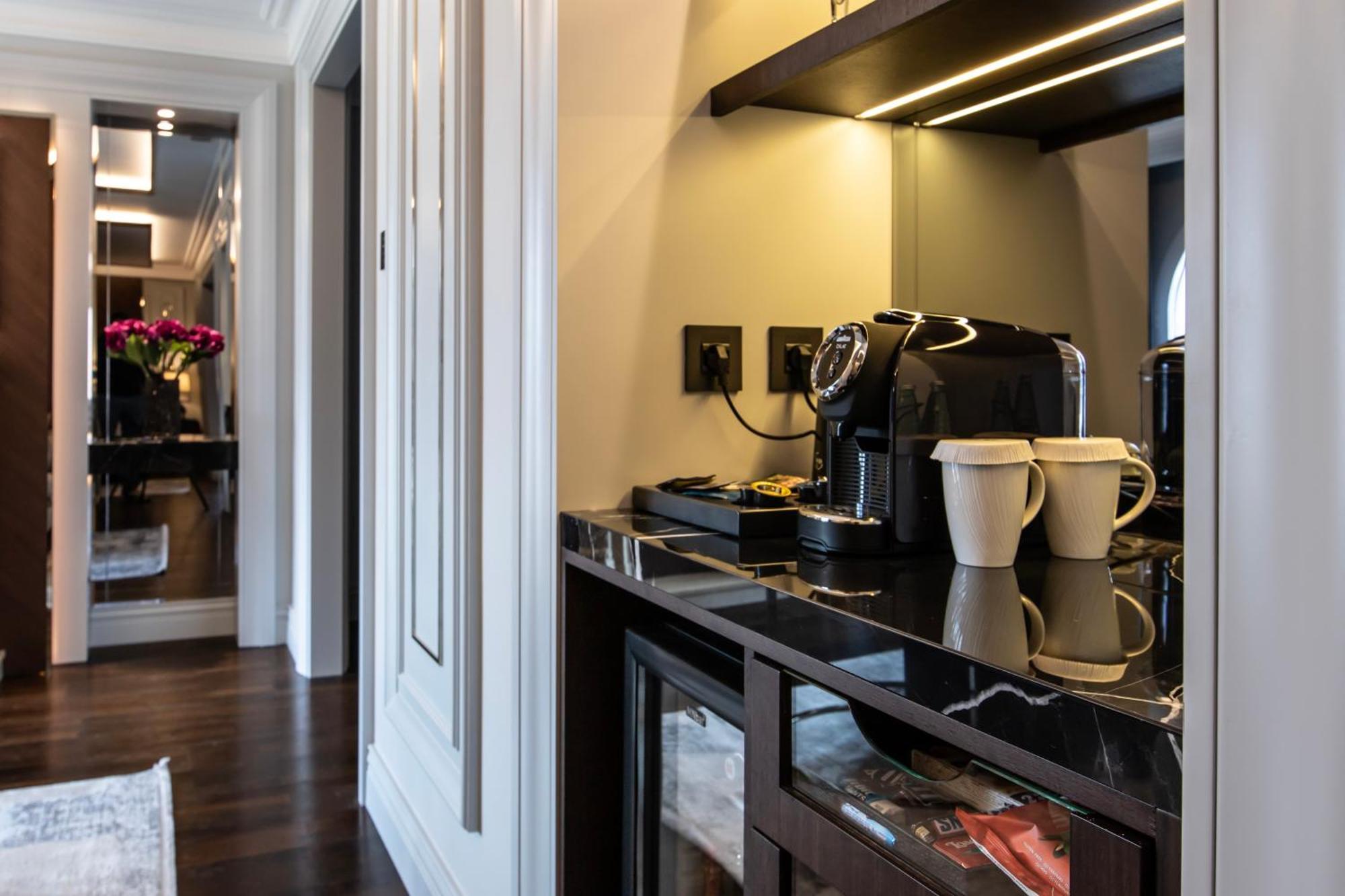 Xheko Imperial Luxury Hotel & Spa Tiranë Ngoại thất bức ảnh A Nespresso machine in a hotel room