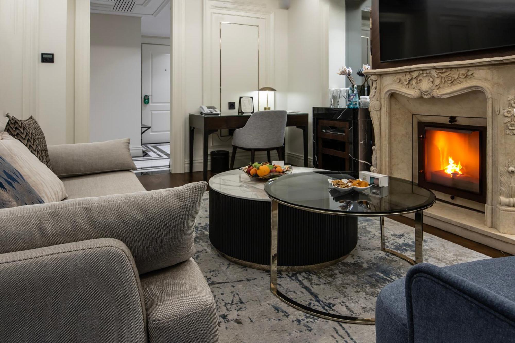 Xheko Imperial Luxury Hotel & Spa Tiranë Ngoại thất bức ảnh A living room in a suite at the Ritz-Carlton, Moscow